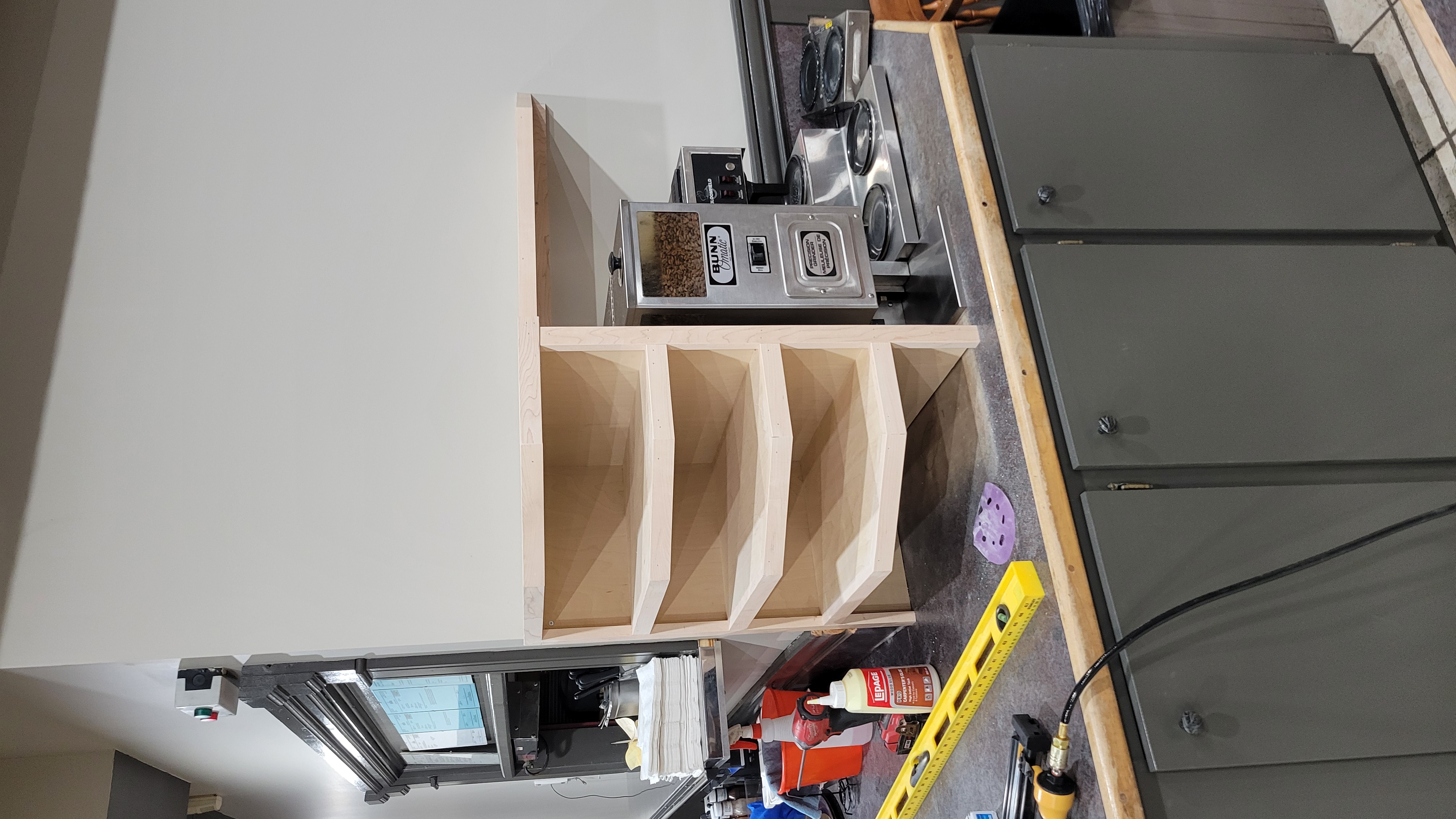 Coffee station cabinetry at The Wetmore-Street Bar & Grill